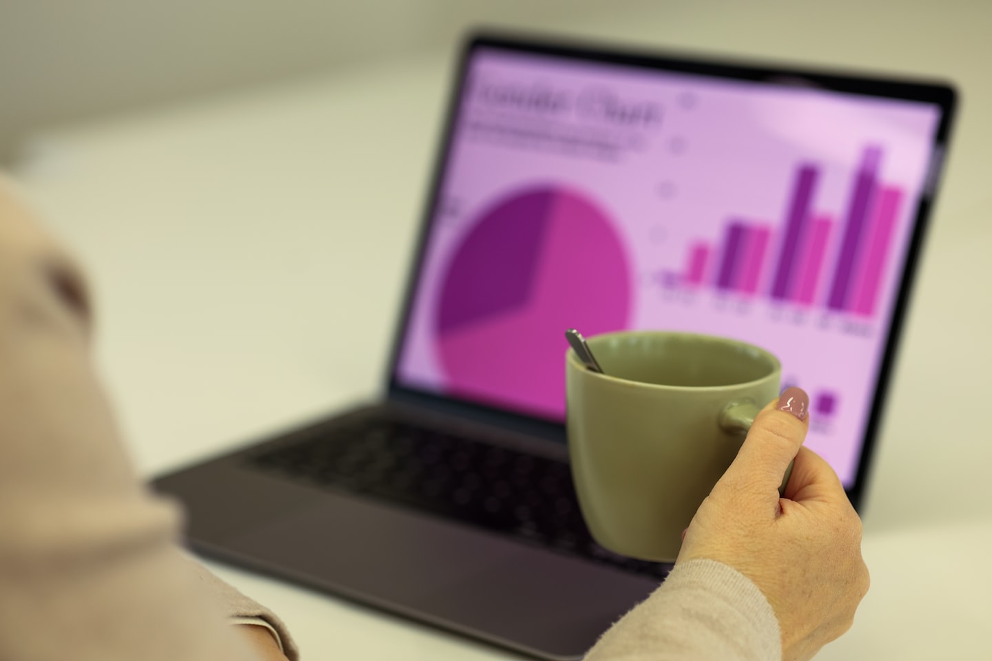A professional reviewing analytics on screen to assess data quality and access controls in a community platform